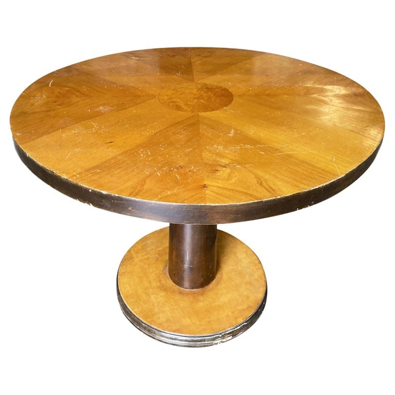 Streamline Round Two-Tone Coffee Table: Streamline Art Deco coffee table manufactured with two-tone design and inlay top. Measure: 30". Reserve: $1,080.00 Shipping: Domestic: Shipping rates are determined by destination International: