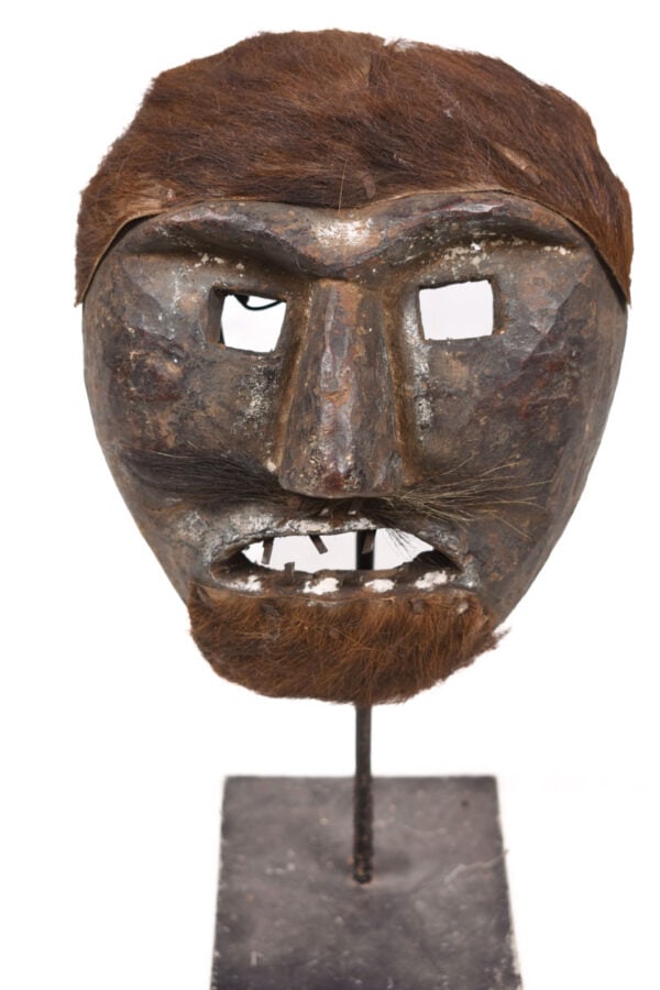 Shaman mask - Wood - Nepal: Such masks are among the most primitive in use in the world, and are made by carving wood. The shaman plays an important social role as the channeler of spirits for healing, purification, and protecti