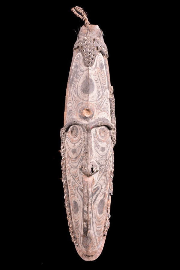 Mask - Wood - Iatmul - Sepek, Papua New Guinea: The Mei masks of the Iatmul people of New Guinea are not face masks, but are tied to a conical structure made of plaited fibers which covers the head and shoulders of a dancer. While similar in