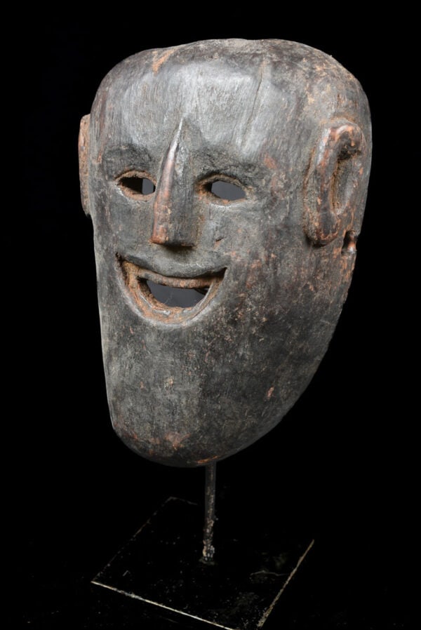 Shaman mask - Wood - Nepal: Such masks are among the most primitive in use in the world, and are made by carving wood. The shaman plays an important social role as the channeler of spirits for healing, purification, and