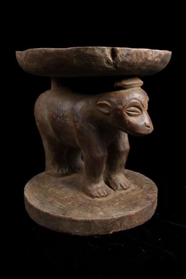 Stool - Wood - Pende - DR Congo: Powerfull Pende leopard stool from DR Congo. In many cultures throughout the southeastern region of the Democratic Republic of Congo the seats of leaders are important symbols of power and authority.
