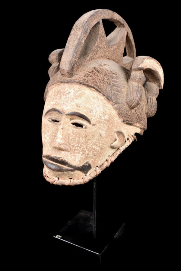 Mask - Wood - Agbogho Mmwo - Igbo / Ibo - Nigeria: Stunning Ibo mask from Nigeria. Ibo or Igbo are known for masquerades associated with the Iko Okochi harvest festival, in which the forms of the masks are determined by tradition, the festival theme