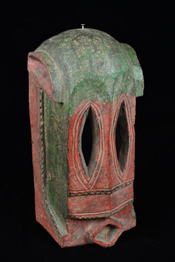Monkey Mask - Wood - Dogon - Mali: Powerfull and stylistic wooden mask from the Dogon tribe of Mali. This Dogon mask is notable for its remarkably rigorous and architectural form. This style of mask is known as dege, the name for a