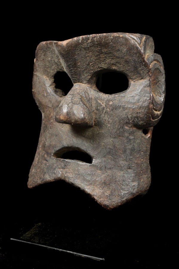 Shaman mask - Wood - Nepal: Tribal mask with red wax stamp on the back. This seal is not just a random mark-it serves an important purpose in verifying the legal export of the mask from Nepal. Such masks are among the most