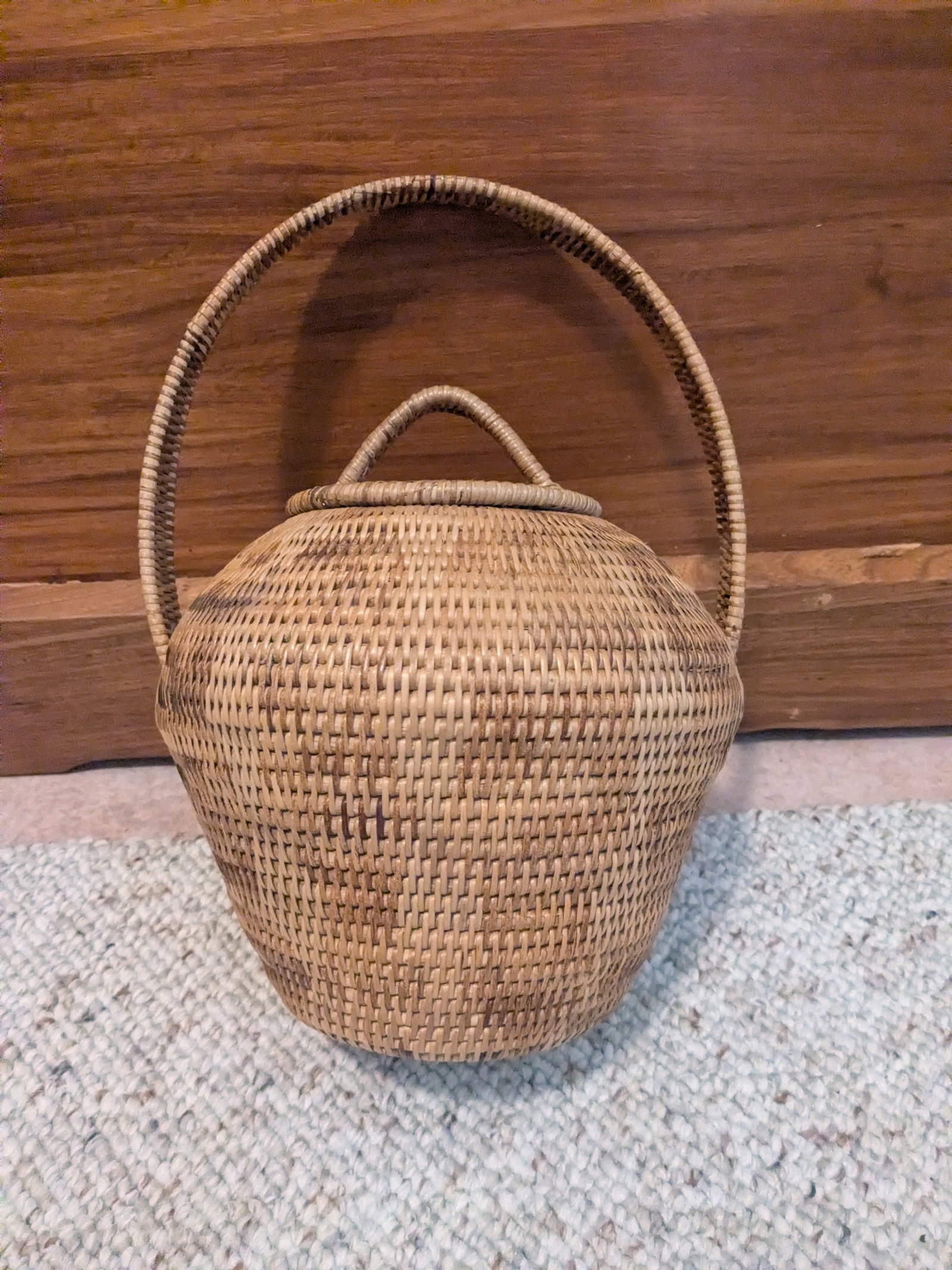 Buka Basket with Lid (1): Title: Buka Basket with Lid (1) Description: Buka Baskets are hand-woven baskets orginally from Buka Island Papua New Guinea, now crafted in both Solomon Islands and New Guinea Highlands. Prized for