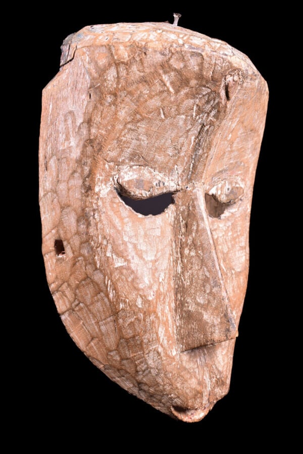 Tribal mask - Wood - Nepal: Old wooden Bodhisattva Mask from Nepal. Tribal mask with red wax stamp on the back. This seal is not just a random mark-it serves an important purpose in verifying the legal export of the mask from