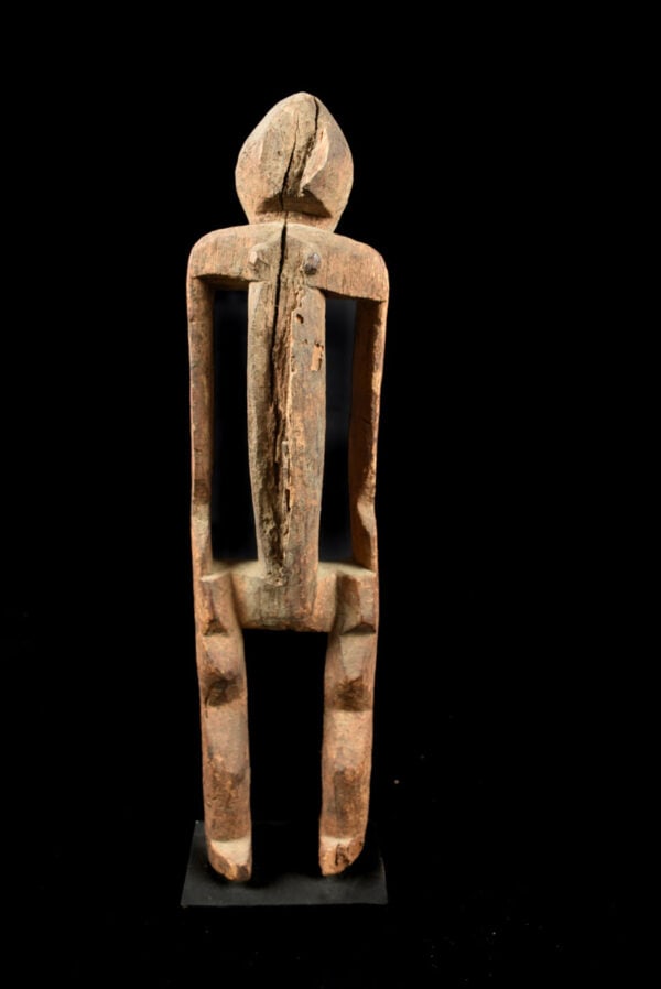 Ancestor figure - Wood - Montol - Nigeria: Stylistic wooden Montol ancestor figure. The Montol are a small ethnic group live on the right bank of the Benue River and are known for their small figures with splayed legs and round heads. These