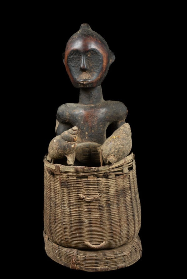 Container - Wood - Fang - Gabon: This is a beautiful old supply/offerings box (Byeri), from the Fang people of Gabon. There is a fang figure carved from wood in the middle of the container. It has a beautiful patina, with clear