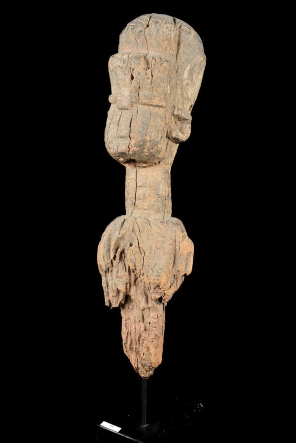 Ancestor Figure - Wood - Lobi - Burkina Faso: Powerfull Lobi figure with raised arm from Burkina Faso. Lobi Figures are the enigmatic, brooding sculpture that protect the Lobi people of Burkina Faso. Most are frontal, symmetrical and timeless sen