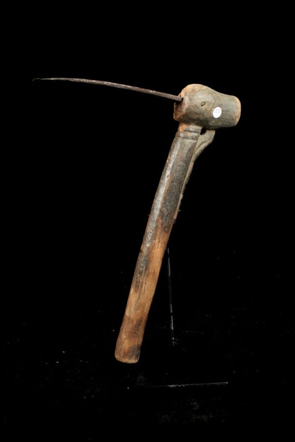 Ceremonial Axe - Metal, Wood - Lobi - Burkina Faso: Beautifull axe with beautiful carved ancestor from the Lobi people of Burkina Faso. Please note the detailed carved wooden arm on the backside of the hendle of the axe. Swords, axes, currency blades a