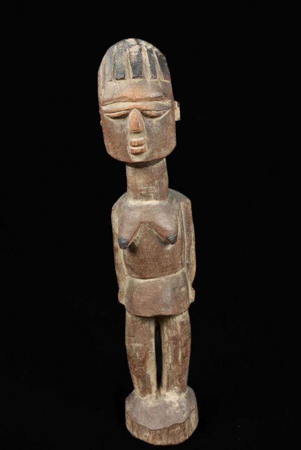 Ancestor Figure - Wood - Lobi - Burkina Faso: Powerfull Lobi figure with raised arm from Burkina Faso. Lobi Figures are the enigmatic, brooding sculpture that protect the Lobi people of Burkina Faso. Most are frontal, symmetrical and timeless sen