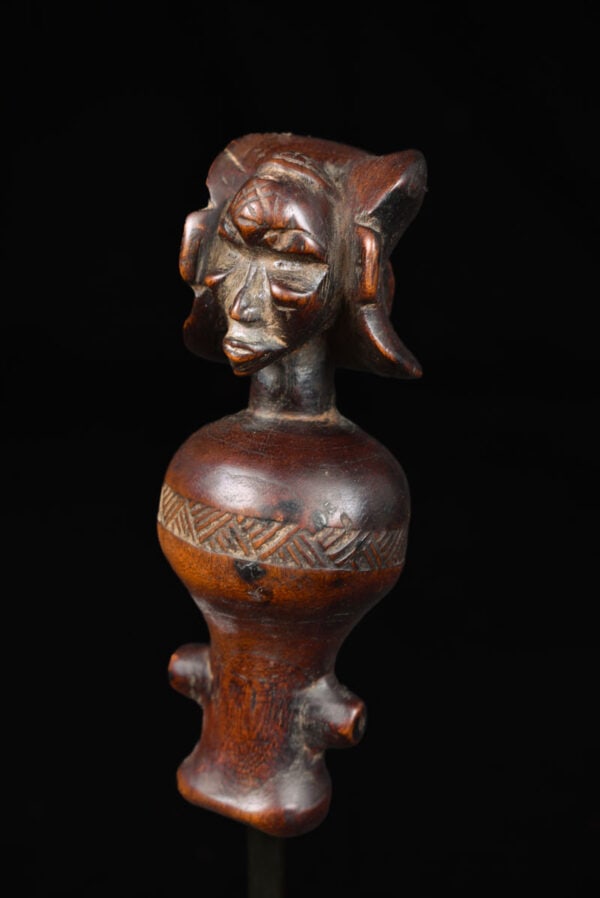 Flute - Wood - Chokwe - DR Congo: Authentic wooden whistle from the Chokwe people of Former Belgian Congo. The flute has a wonderful aged patina. Chokwe men use small whistles like this to communicate with one another and with their d