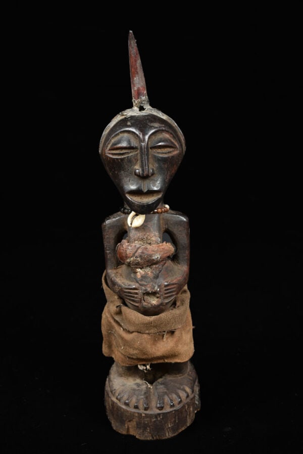 Power Figure - Wood, Horn - Songye - Congo: Great wooden Songye power figure from DR Congo. Stylistic wooden ancestor figure the SONGYE tribe from D.R. Congo. It served to protect the family against diseases, accidents, bad spirits and bewitchm