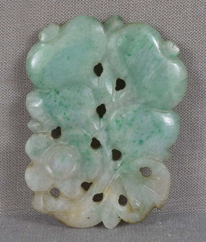 18c Chinese JADEITE carving flowers & fruit: Late 18th to early 19th century Chinese jadeite carved plaque plaque for sawing onto clothes with carved and pierced decoration of flowers and fruit. Beautiful natural untreated jadeite with rich