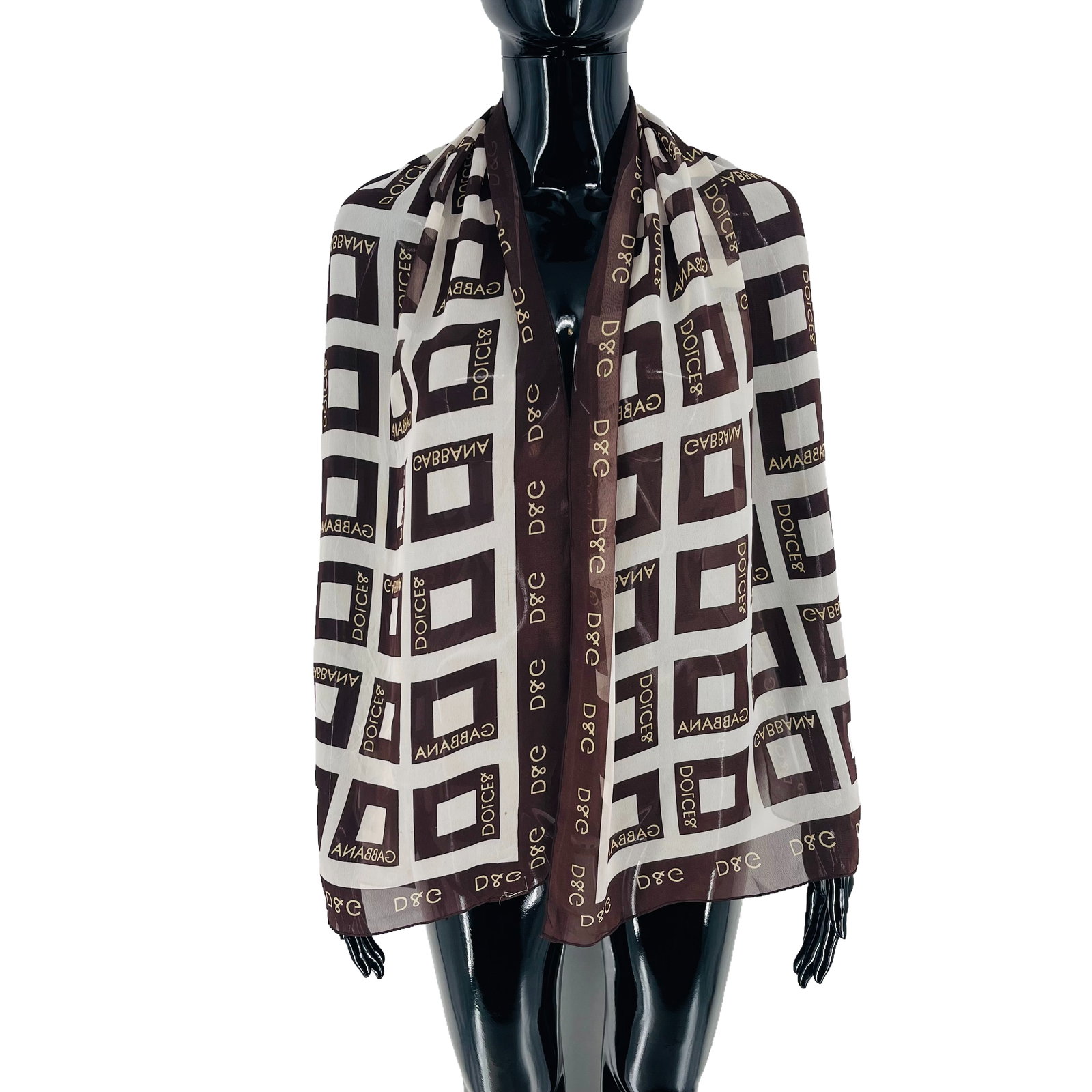 Dolce&Gabbana Brown Printed 100% Silk Scarf: Title: Dolce&Gabbana Brown Printed 100% Silk Scarf Brand:Dolce&Gabbana Date/Period:Modern Materials:100% Silk Size:One Size Description:Dolce&Gabbana Brown Printed 100% Silk Scarf Reserve: $80.00