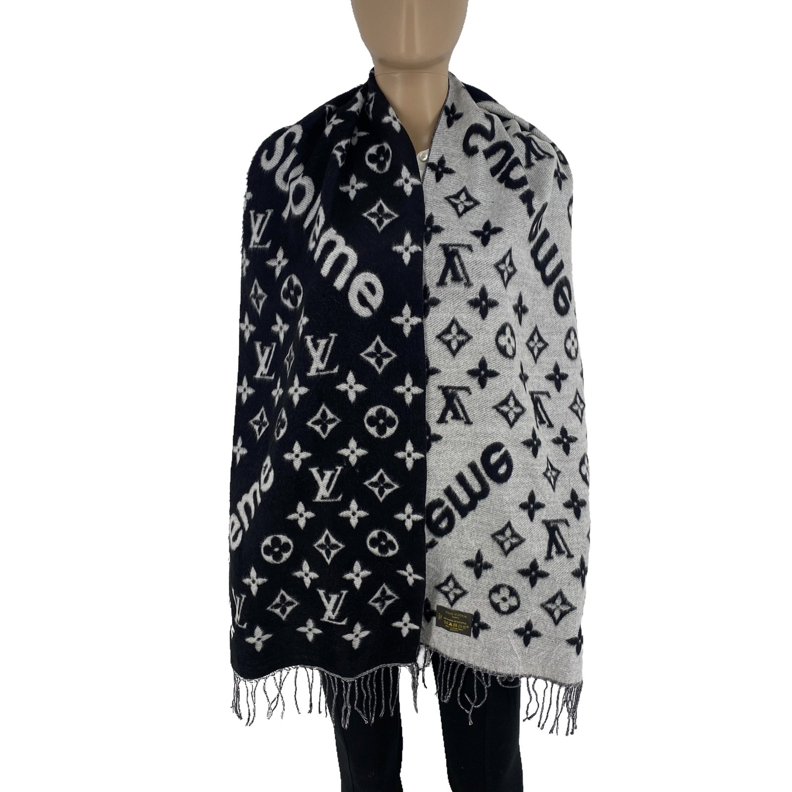 Louis Vuitton X Supreme Black & White Wool Blend Scarf: Title: Louis Vuitton X Supreme Black & White Wool Blend Scarf Brand:Louis Vuitton Date/Period:Vintage Materials:60% Wool 40% Acrylic Size:One Size Description:Louis Vuitton X Supreme Black & White Woo