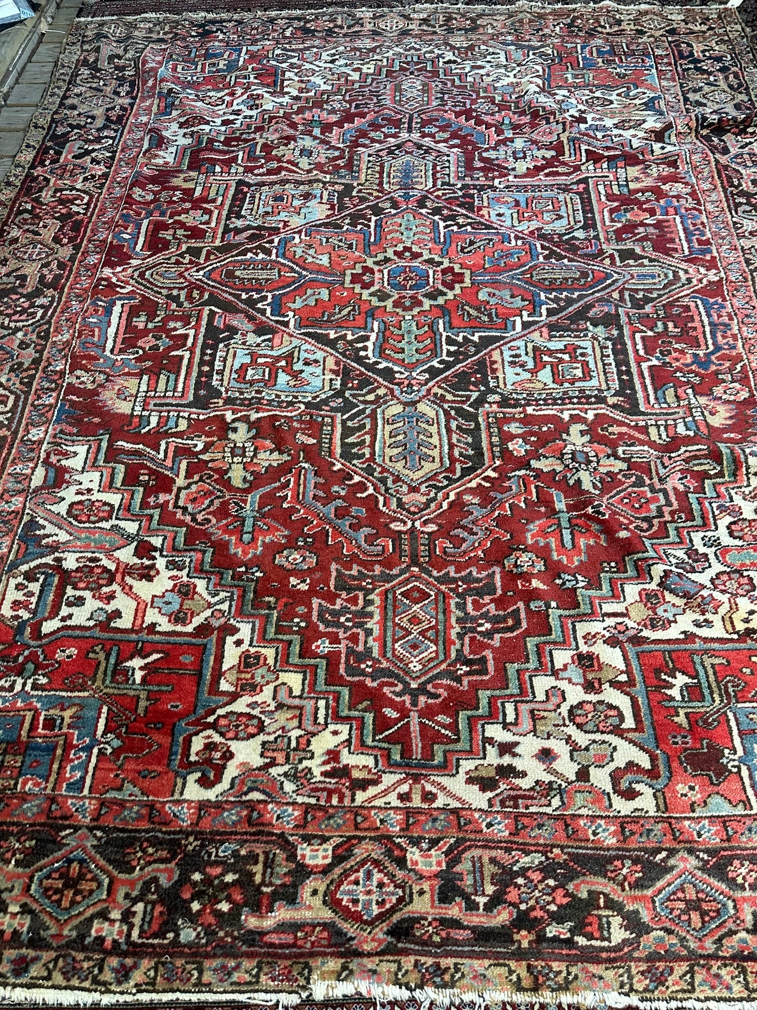 Hand Knotted Heriz -8.5x12.9: Title:Hand Knotted Heriz -8.5x12.9 Description:Hand Knotted Heriz -8.5x12.9 ft Size:8.5x12.9 ft Circa:1980 Origin: Material:100 %Wool Reserve: $800.00 Shipping: Domestic: Flat-rate of $165.00 to