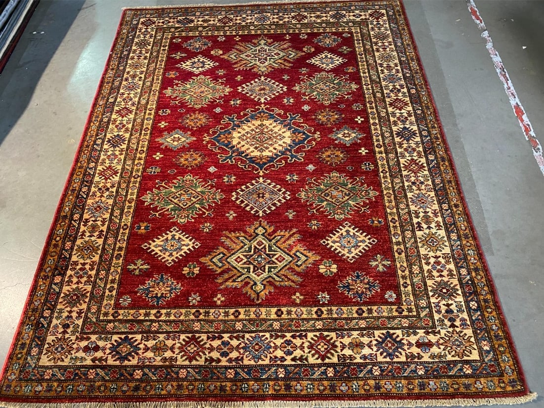 FINE SUPER KAZAK RUG 5'.1"X6'.8": Title:FINE SUPER KAZAK RUG 5'.1"X6'.8" Description:5'.1"X6'.8" Super quality Kazak Rug, hand spun and hand knotted rug in Pakistan 100% natural Vegge Dye wool pile, in Vivid Red , Ivory and multi