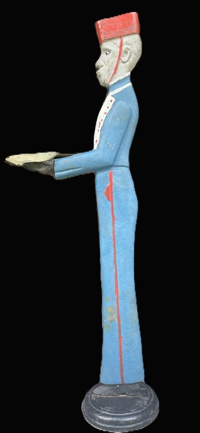 CAST IRON BLACK AMERICANA BELLBOY 38" HOTEL BELLHOP SMOKING STAND: Date/Period: UNKNOWN Dimension: Approx. 38" x 17 x 9 Material: CAST IRON Additional Information: Vintage Black Americana BellhopThis is a great piece of Black Americana History! Most of these bellhops