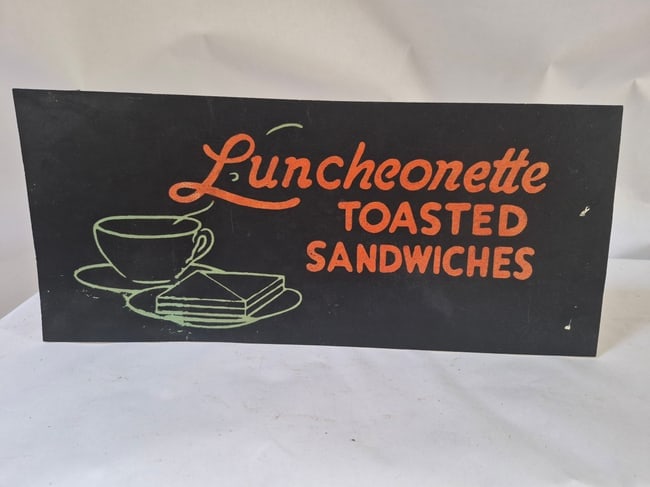 Sign found in Pennsylvania. Lightweight cardboard, c. 1940s: 16 1/2" long, excellent condition. Black background with green and red letters Shipping: Domestic: Shipping rates are determined by destination International: Foreign shipping rates are determined by