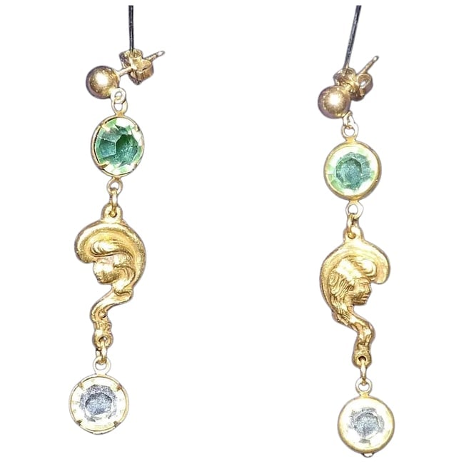Gibson Girl Face Post Earrings: This pair of Gibson Girl Face Post Earrings are in excellent condition. They measure 1 7/8" in length x 3/8" in width. These are very art deco looking. Shipping: Domestic: Flat-rate of $12.00 to