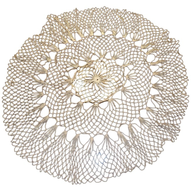 Large Crochet Round Tablecloth: This Large Crochet Round Tablecloth has a unique design and measures 40" in diameter. It has no stains or rips but does need washing and starching to make it pristine. I have had it on a round Duncan 