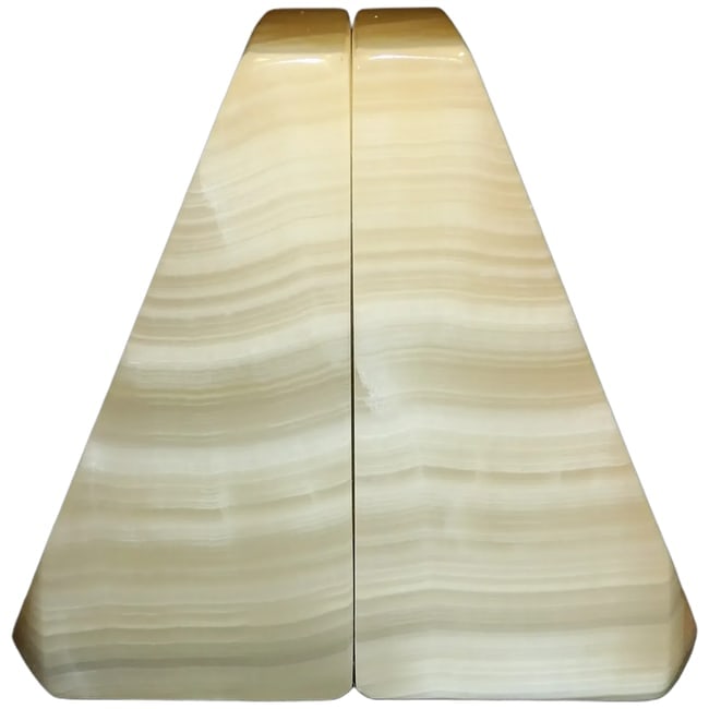 Pair of Polished Onyx Bookends: This Pair of Polished Onyx Bookends measures 5 182" H x 3" W x 3 1/4" D. They are in excellent condition. One has what appears to be a chip at the bottom right looking straight on. However, it was it