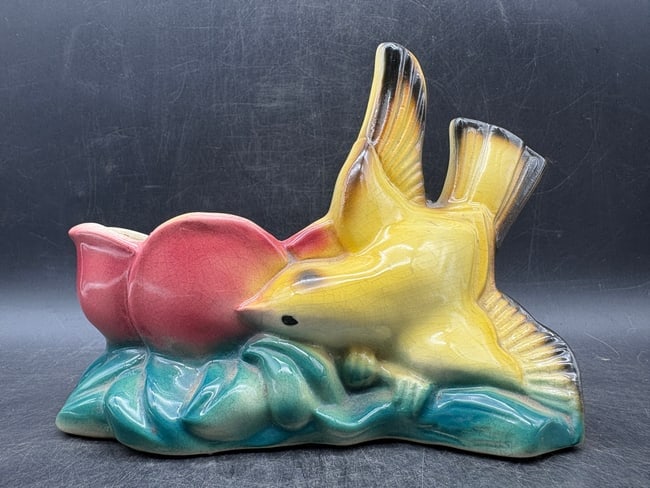 Vintage McCoy Bird Planter Yellow Green Red Tulip Mid Century Pottery USA: Date/Period: late 1940s-1950s Dimension: Approx. 5.75" x 7" x 3.5" Material: ceramic Additional Information: Vintage McCoy pottery bird planter featuring a brightly glazed mid-century design with a ye