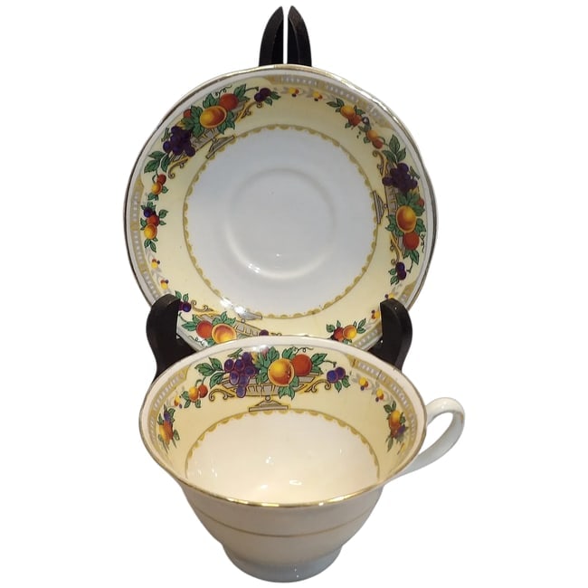 Heathcote China Tea Cup and Saucer: This particular pattern of Heathcote China Tea Cup and Saucer is difficult to find. It would be a great addition to any collection. The saucer is 5 1/2" in diameter. The coffee cup is 3 3/4" in diamet