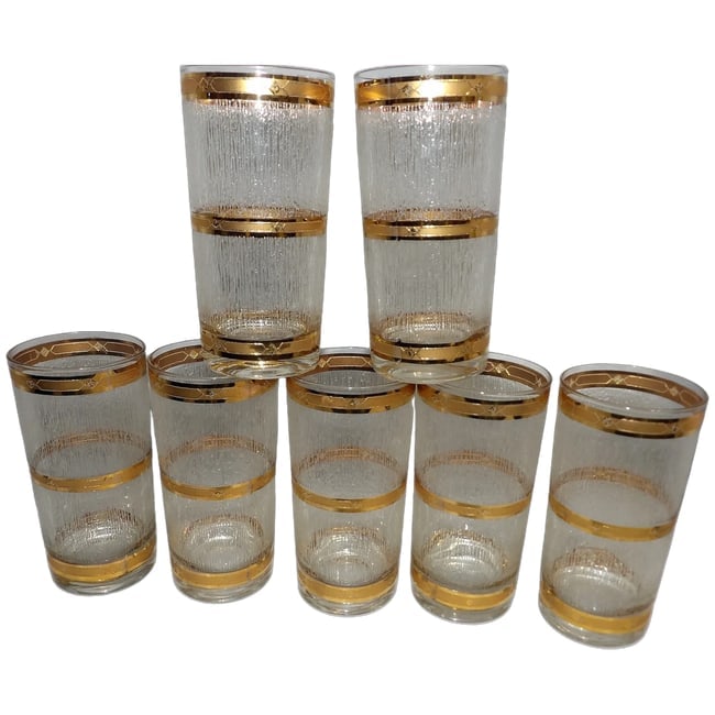 Vintage Culver Highball Glasses: MCM 22K Gold Icicle Barware, Set of 7: This set of 7 Culver 22k Gold Accented Icicle High Ball Glasses are in near MINT condition. They measure 5 3/4" H x 2 3/4" Dimeter and hold 12 oz. Culver is know for outstanding glassware and these