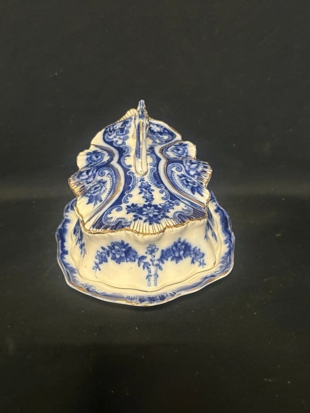 Flow Blue Covered Cheese Dish: It measures 8 5/8" x 6 1/2" x 5 1/4" high and dates around the 1870's. It has no chips, cracks or repairs Shipping: Domestic: Flat-rate of $15.00 to anywhere within the contiguous U.S. International: