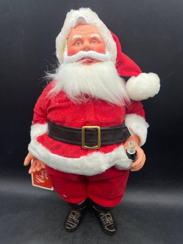 New Old Stock Collector Club Coca Cola Santa Claus Doll: Date/Period: 1992 Dimension: Approx. 16" tall Material: mixed materials Additional Information: New Old Stock Collector Club Coca Cola Santa Claus Doll Shipping: Domestic: Flat-rate of $15.00 to anywh