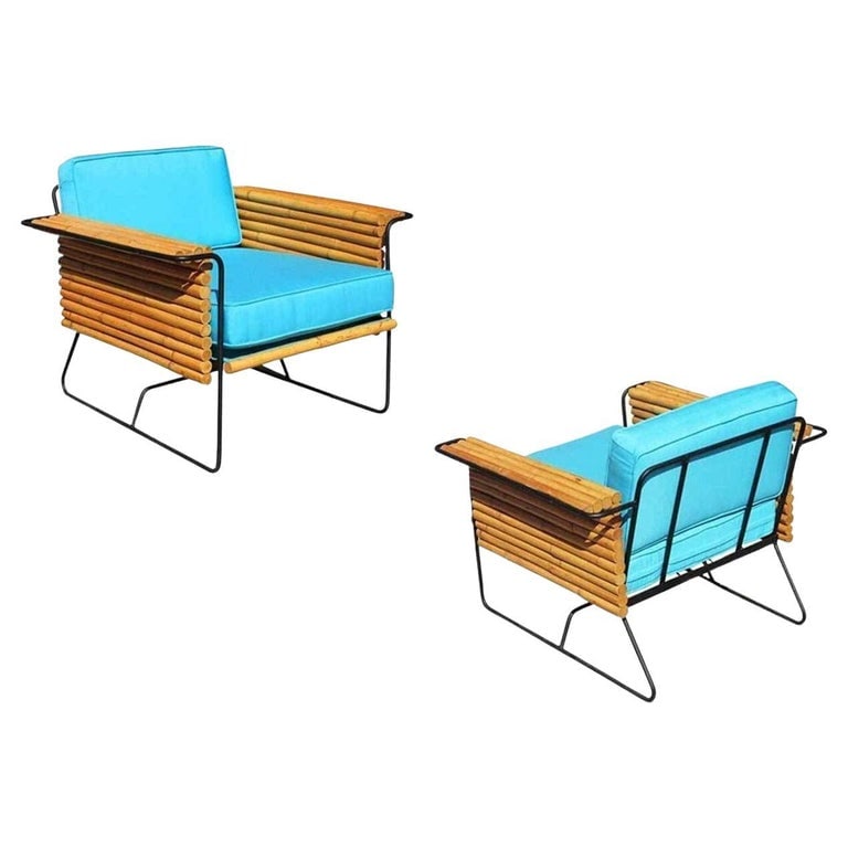 Restored Pair of Wrought Iron and Rattan Ski Club Lounge Chairs by Shirley Ritts: Unique set of two 1950s iron and rattan "Wrought" ski club chairs by designers Herbert and Shirley for their Ritts Company of California. Restored to new for you. We only purchase and sell the best