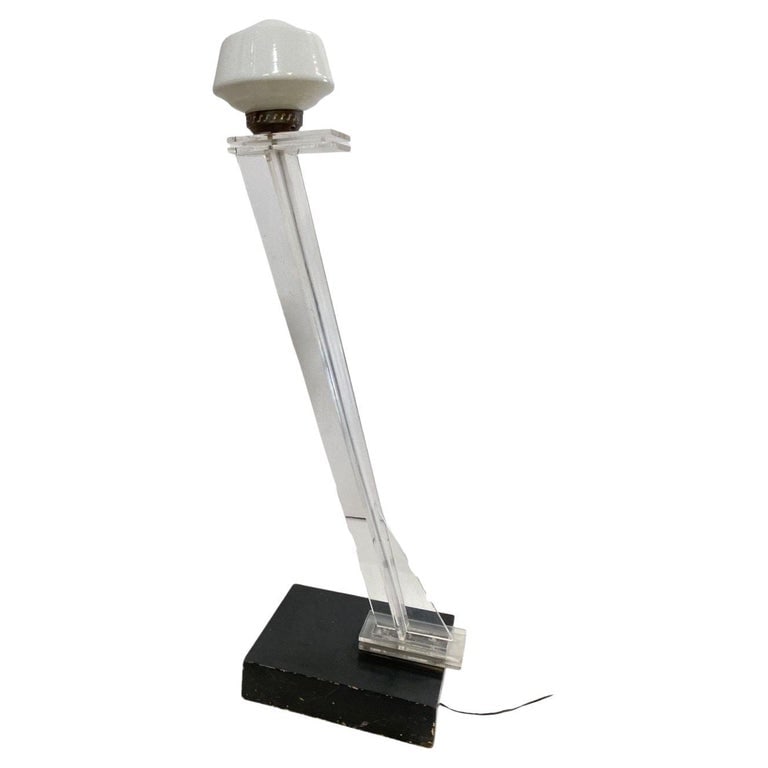 Mid Century Clear Lucite Sculptural Floor Lamp: Hand-made abstract Mid-century floor lamp featuring a slanted clear Lucite sculptural fixed to a black lacquered wood base with a white schoolhouse glass lamp shade. Circa 1950. Reserve: $1,470.00