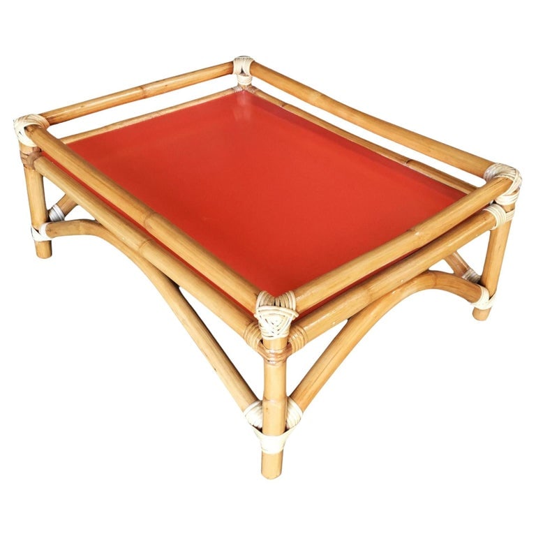 Restored Arched Rattan Ottoman Stool with Fenced Top: Restored arched rattan ottoman stool with fenced top. Restored to new for you. We only purchase and sell the best and finest rattan furniture made by the best and most well-known American designers