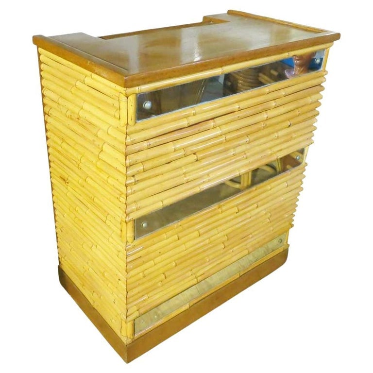 Restored Mirror Front Stacked Rattan Bar & Mahogany Top, 1940: Restored Mirror Front Stacked Rattan Bar & Mahogany Top, 1940 1940, United States We only purchase and sell the best and finest rattan furniture made by the best and most well-known American designers