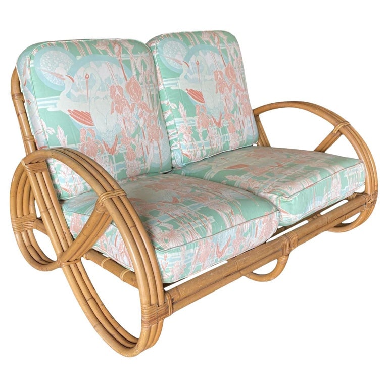 Restored Modernist 3-Strand Round Full Pretzel Rattan Settee: Restored mid-century era round full pretzel two-seat settee Loveseat with a three-strand round pretzel armrest. 1950, United States We only purchase and sell the best and finest rattan furniture made