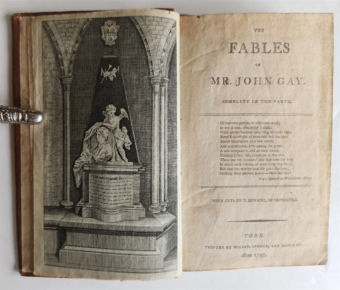 1797 FABLES of JOHN GAY antique ILLUSTRATED in ENGLISH poetry: The Fables of Mr. John Gay York, Wilson et al. 1797 With frontispiece and woodcuts. Original calf Back cover is almost detached, with some damage to the leather at the back Size 3 1/2 by 5 3/4" Text i