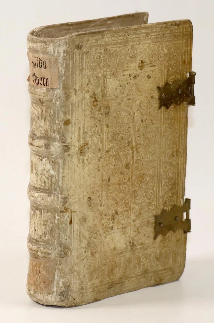 1592 POETRY by Marcus Hieronymus Vida antique BLIND-TOOLED PIGSKIN BINDING 16 C.: Opera. Quorum catalogum sequens pagella continent. by Marcus Hieronymus Vida Lyon, A. Gryphius; 1592 573 pp. With two woodcut printer's marks. Original blind-tooled pigskin binding over wooden boards