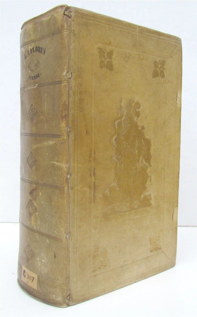 1744 ROMAN HISTORY ARMORIAL VELLUM BINDING ILLUSTRATED w/ MAP antique by FLORUS: Florus, Lucius Annaeus Epitome Rerum Romanarum. Ed. C.A. Duker. Leyden, S. Luchtmans, 1744 2 parts in 1 vol. (58),858[ 874],(120),39[ 47],(1)p., Engraved frontispiece, folding map, full-page illustrat