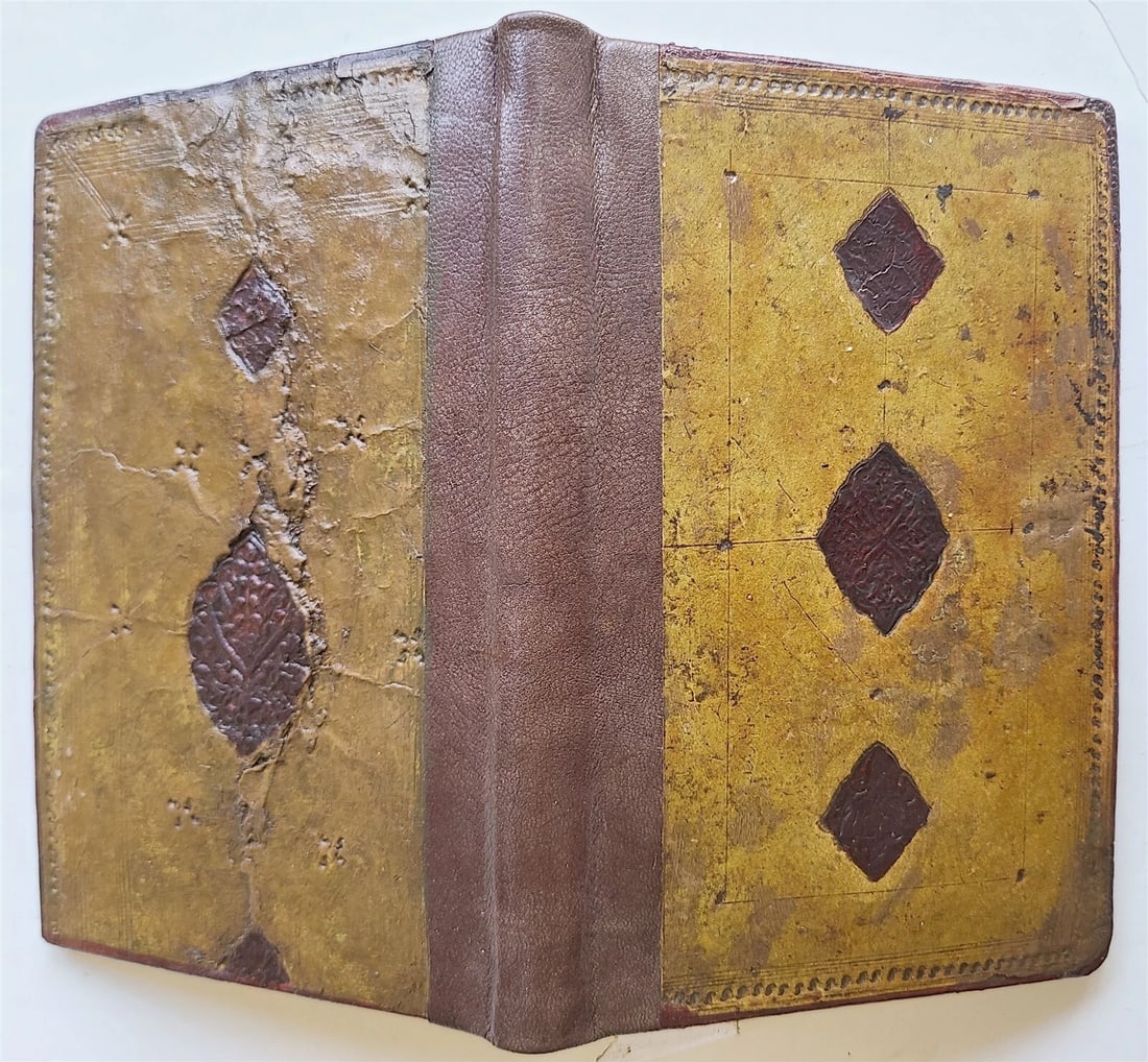 early 1800s ARABIC MANUSCRIPT antique ISLAMIC: Purchased in Uzbekistan Original binding with embossed medallions Size 5 1/2 by 8 1/3" Nice calligraphy 82 lvs (164 pp) Good condition, minor wear, binding restored Powered by SixBit's eCommerce