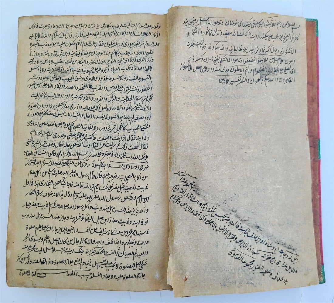19th c. ARABIC MANUSCRIPT ISLAMIC LAW BOOK antique Mukhtasar al-Wiqayah SADR: Nukaya Mukhtasar al-Wiqayah by Sadr al-Shari'a al-Asghar Text in Arabic, Nastaliq script 19th century Purchased in Uzbekistan Original binding with embossed medallions Size 7 1/4 by 10 1/2" Nice