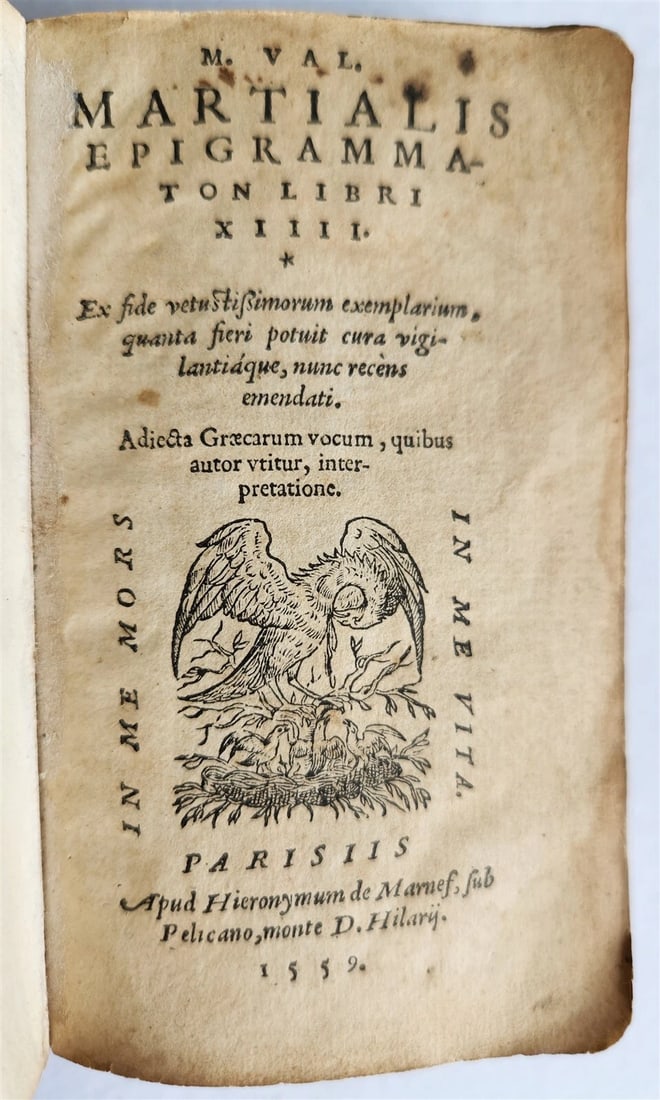 1559 EPIGRAMMATA by VALERII MARTIALIS antique 16th CENTURY: MARTIALIS, VALERII Epigrammaton libri XIIII. Paris: De Marnef; 1559 Printer's mark on the title page and colophon, woodcut initials browning, slight foxing, occasional stains Later wraps, gilt edges