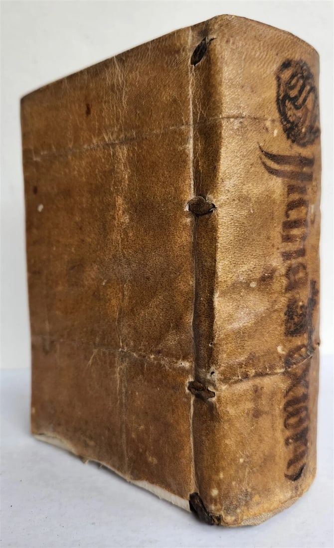 1551 Jean TIXIER antique VELLUM BOUND Officinae Ioannis Rauisii Textoris: TIXIER, Jean. Officinae Ioannis Rauisii Textoris Lugduni (Lyon): Grifio, 1551 2 parts in one volume Printer's mark on the title pages, woodcut initials (restorations and losses on the title page,