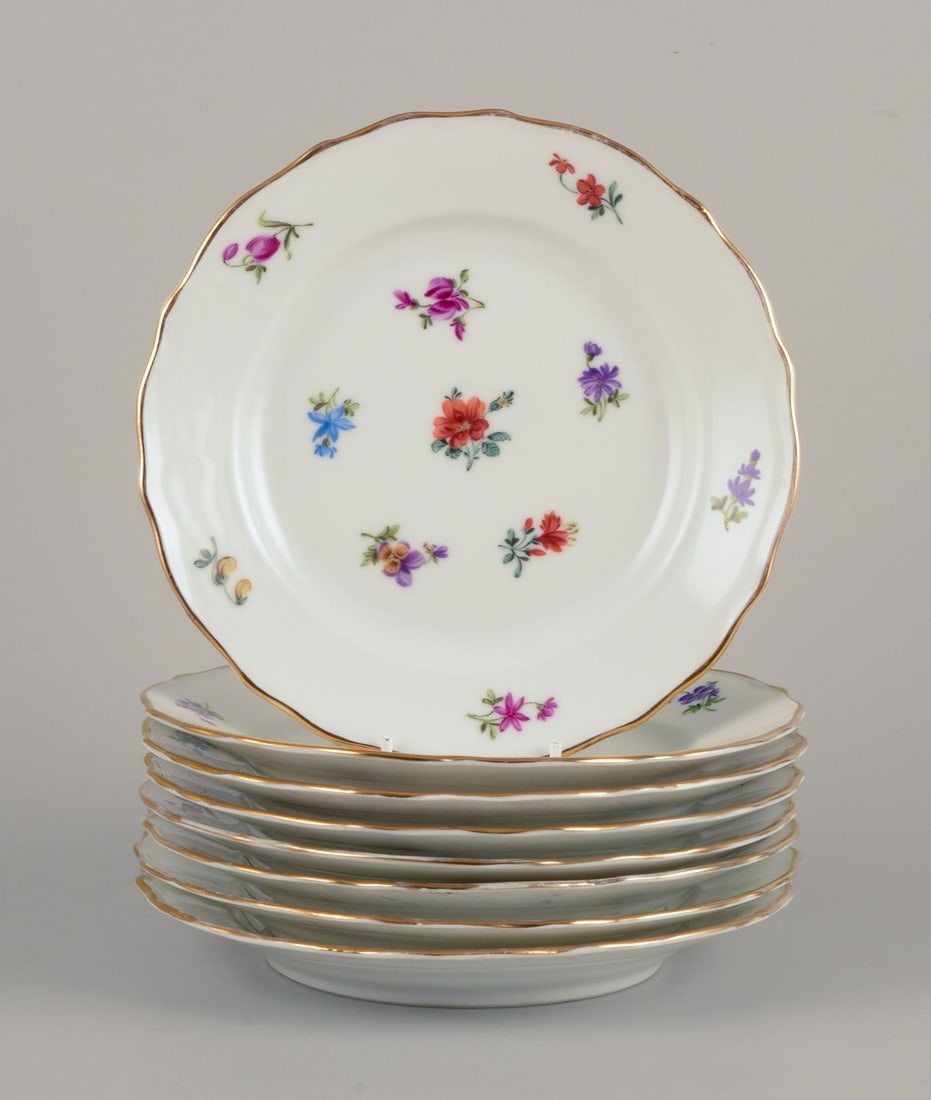 Silesia, Germany. Eight lunch plates in porcelain with floral motifs. Approx. 1930s.: Silesia, Germany. Eight lunch plates in porcelain. Hand-painted with floral motifs in polychrome colors, gold rim. Approximately from the 1930s. Stamped "Silesia". In good condition, with minor wear
