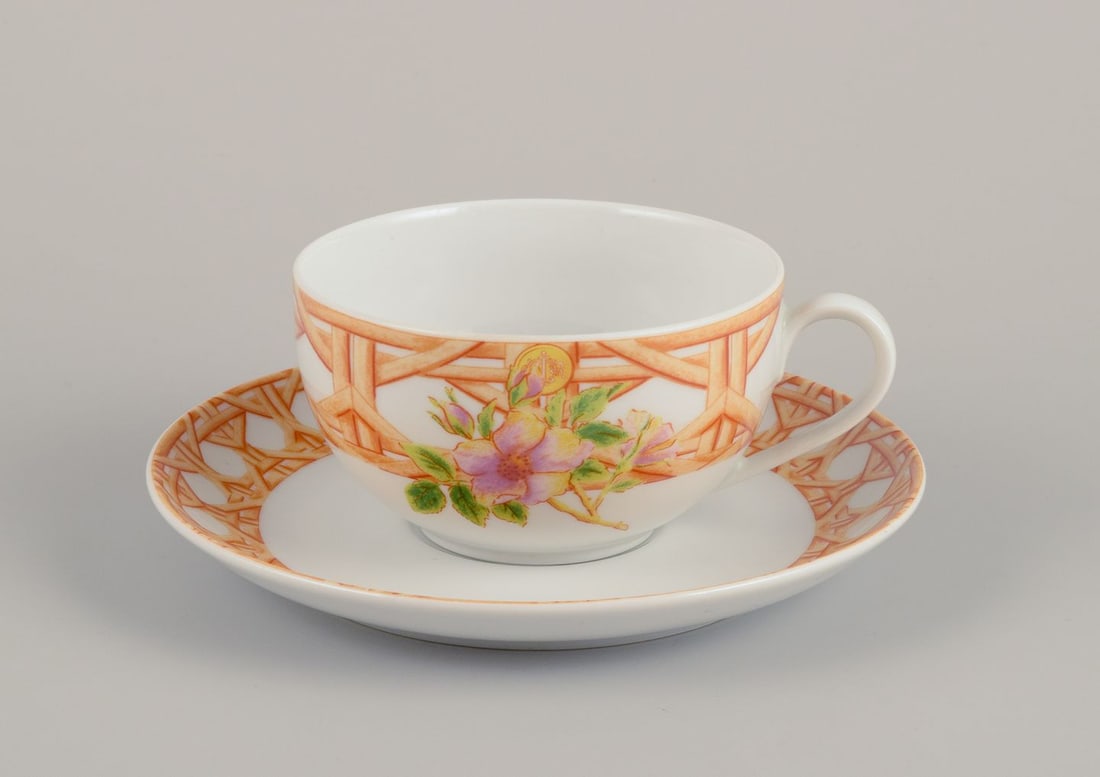 Christian Dior, Paris. Four pairs of coffee cups and saucers. Floral motif. Late 20th C. - 2