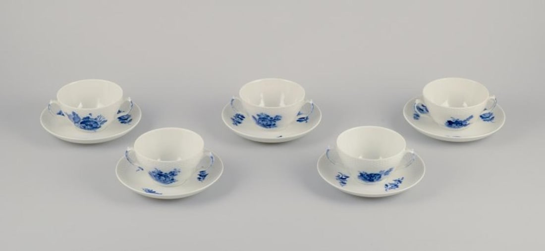 Royal Copenhagen Blue Flower Braided. Set of five pairs of bouillon cups and saucers in porcelain.: Royal Copenhagen Blue Flower Braided. A set of five pairs of bouillon cups. Hand-painted with blue floral motifs. 1970s. Marked. First factory quality. Perfect condition. Cup: D 10.5 cm without handle
