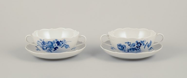 Meissen, Germany. Two pairs of bouillon cups in blue-painted porcelain. Mid-20th C.: Meissen, Germany. Two pairs of bouillon cups in blue-painted porcelain. Hand-painted with floral motifs and insects in blue. Mid-20th century. Marked. Fifth factory quality. In excellent condition