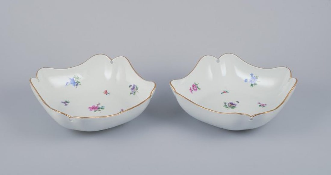 Meissen, Germany, two square porcelain bowls. Approx. 1920s: Meissen, Germany, two square bowls. Hand-painted with polychrome floral motifs, gold rim. Approximately from the 1920s. Marked. First factory quality. Perfect condition. Dimensions: Diameter 21.0 cm