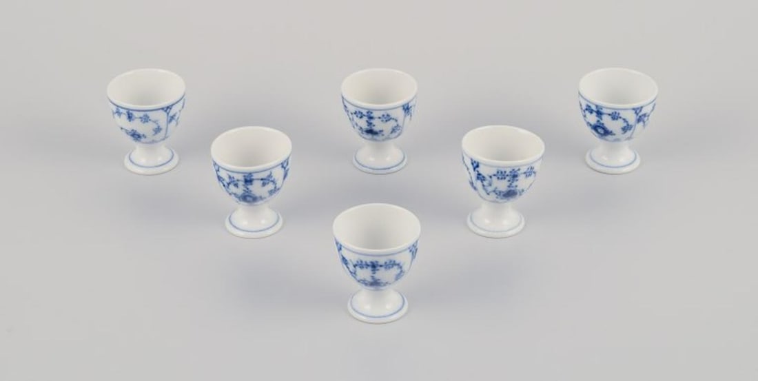 Royal Copenhagen Blue Fluted Half Lace. Six egg cups. Early 20th C.: Royal Copenhagen Blue Fluted Half Lace. Six egg cups. Early 1900s. Model number: 1/2026. Marked. Second factory quality. Perfect condition. Dimensions: H 5.5 cm x D 4.8 cm. Reserve: $336.00 Shipping: 